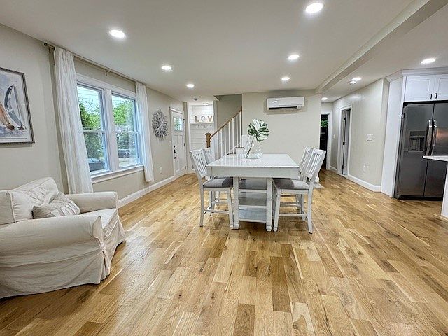 Dining room area open to kitchen.