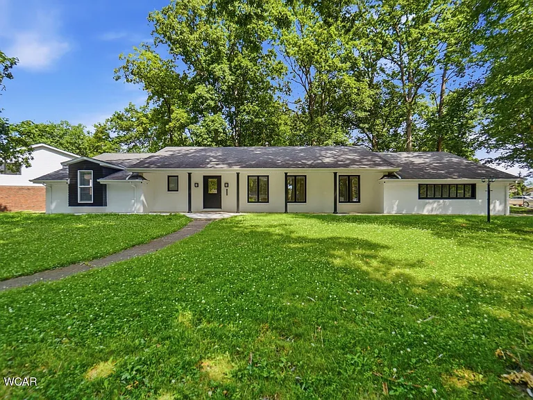 3410 Greens Rd — Photo 1