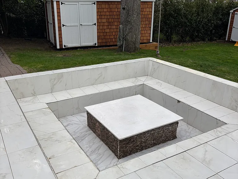 Patio featuring sunken firepit for nights spent outside!
