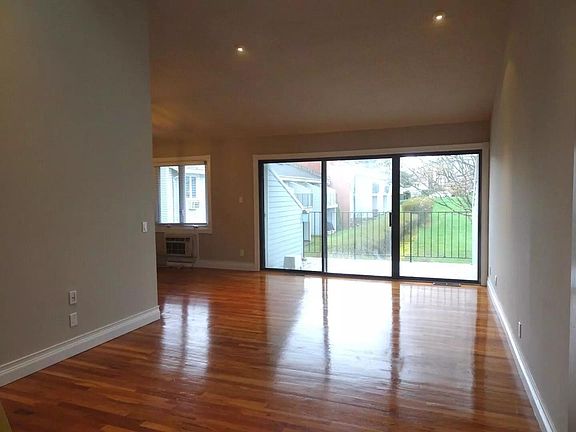 Livingroom with access to balcony.