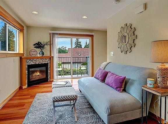 Homey Living Space with Gas Fireplace and Patio