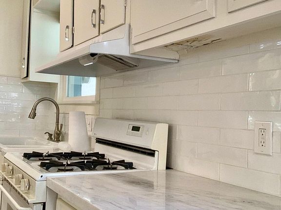 all new tile and countertop.