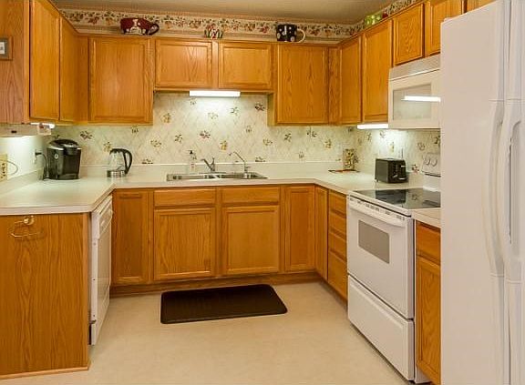 Opposite the dining room, take a look at the spacious kitchen area.