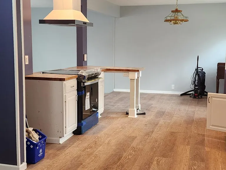 The kitchen and dining area. make sure you see the peninsula. enough for 2 or 3 people