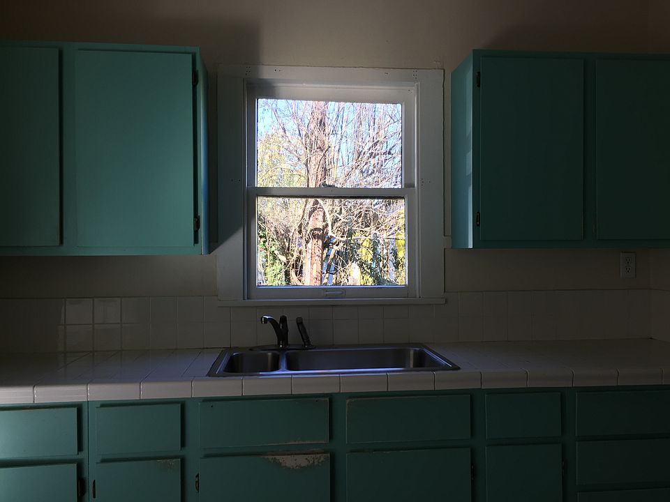 Kitchen window (cabinets pre-remodel)