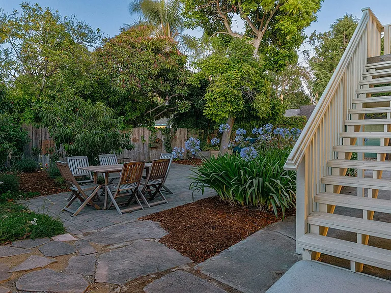 A beautiful landscaped garden with fruit trees