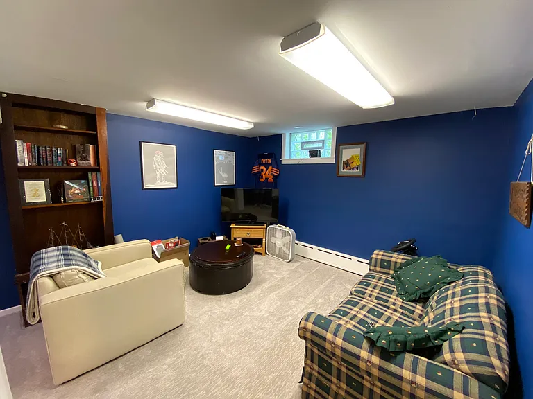 Fully finished lower level living space with newer carpet