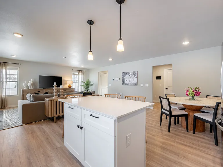 This modern kitchen pairs sleek finishes with plenty of space to cook, sip, and gather.