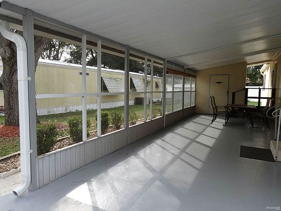 Carport with shed