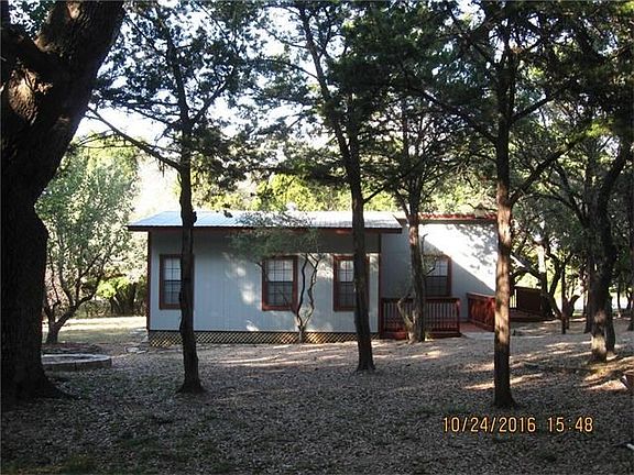 Home has metal roof, fresh paint inside and out and new central heating and air conditioning equipme