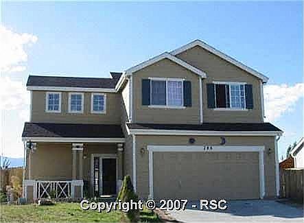 Nice porch and garage