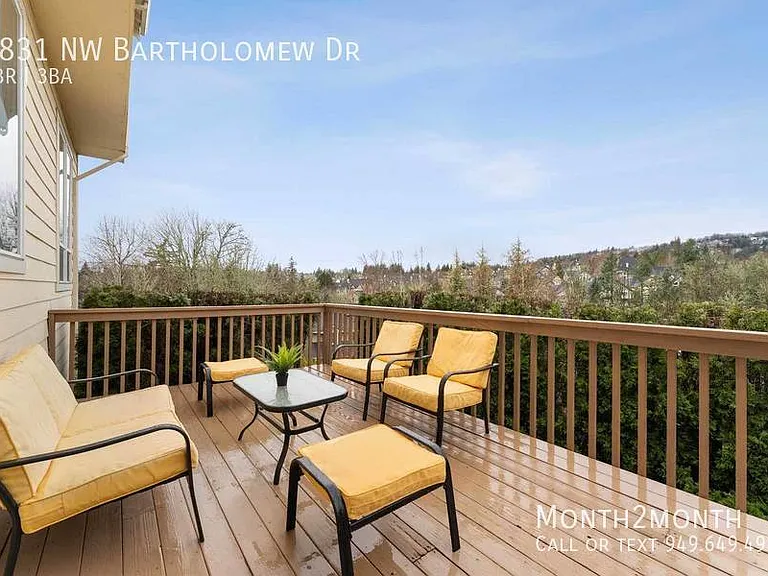 9831 NW Bartholomew Dr — Photo 31