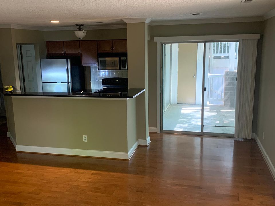 Room for breakfast table and sliding glass door out to deck