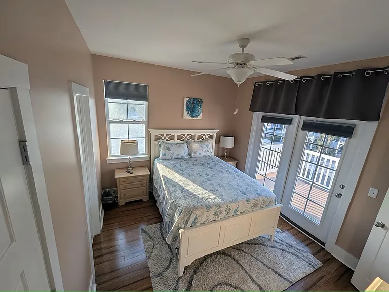 Guest Bedroom #2 (door leads outside to top deck -- with view of the ocean!)