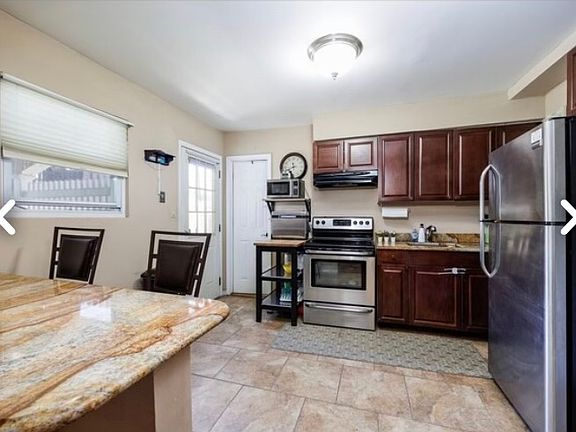 5th image of 4431 Broadway Floor 1