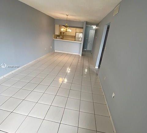 2nd image of 6095 W 19th Ave APT 403