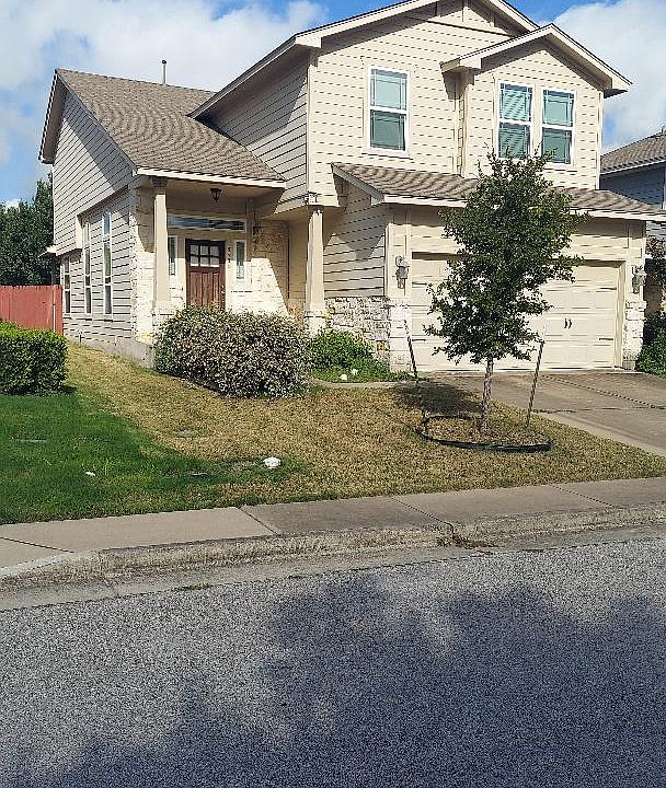 FRONT OF HOUSE. 2 BLKS TO POOL AND PLAYGROUND