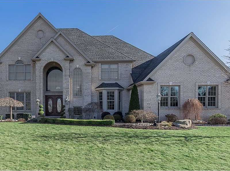 One of a kind custom built 4 bedroom/5 bath estate