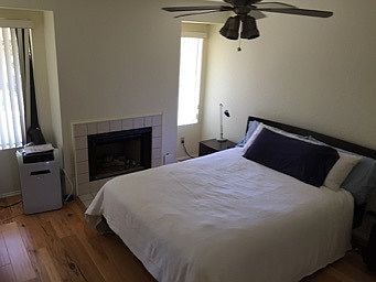 Upstairs bedroom with fireplace