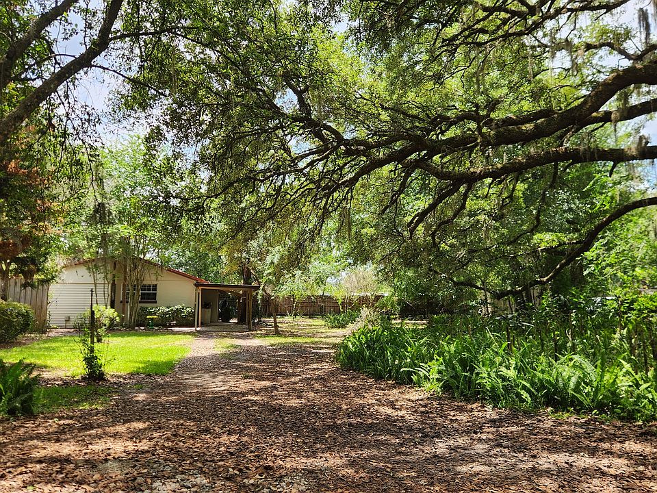 Set in the woods with a big yard, this home offers serenity and privacy.