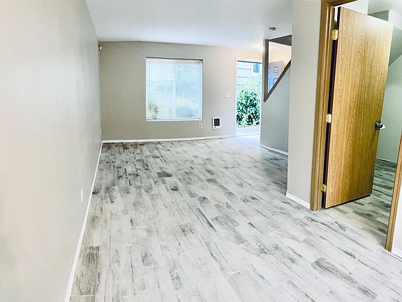 View from the nook area, half bath on the right