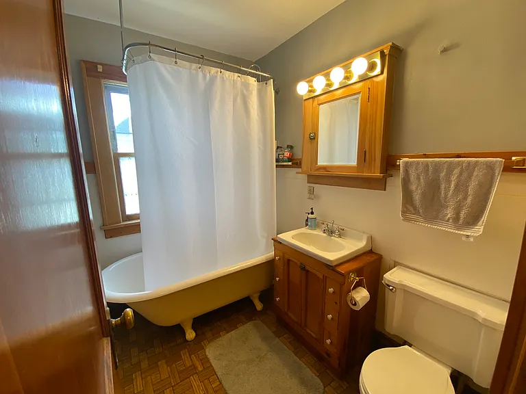 Upper-level bathroom with clawfoot tub