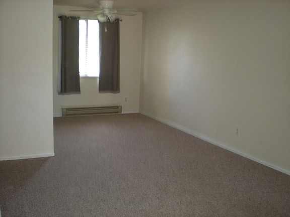 Open floor plan with contemporary colors. Berber style carpet.