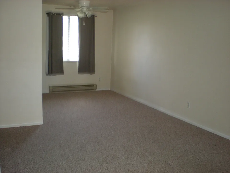 Open floor plan with contemporary colors. Berber style carpet.