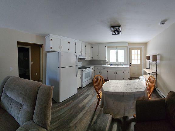 Living room and kitchen as you enter.