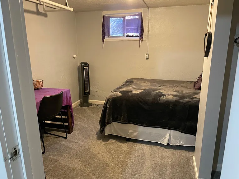 Second room, with workspace and reach in closet.