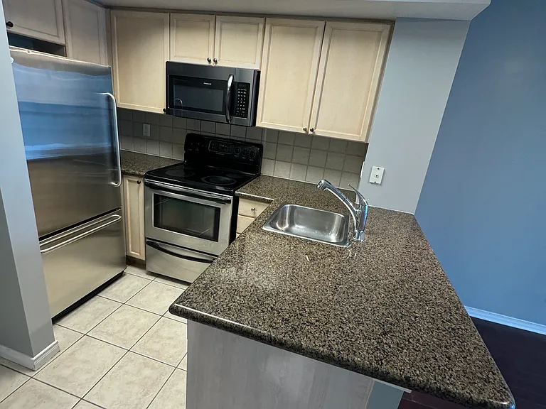 28 Harrison Garden Blvd #25 — Photo 8