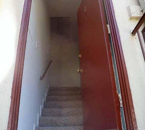 Looking inside the front door, you can see the coat closet a