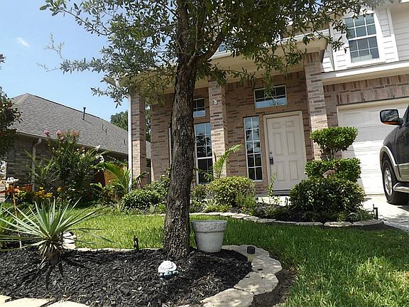 Beautifully landscaped and ready to call home.