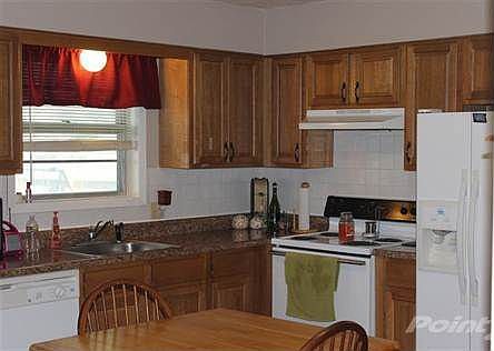 Cabinets and countertops upgraded with newer appliances