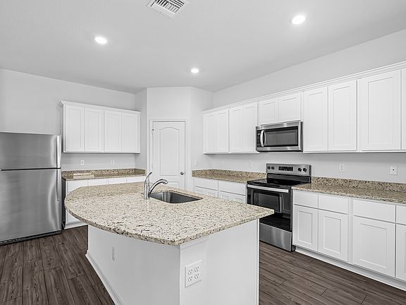 This beautiful dream home comes with energy-efficient appliances already included