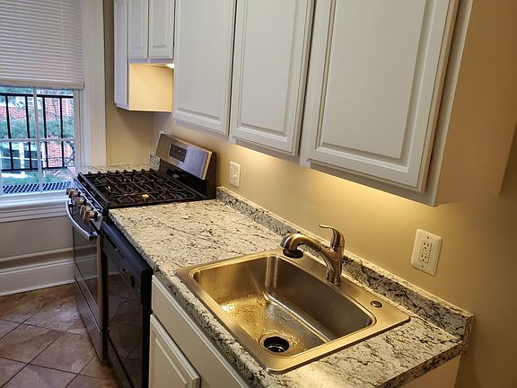 Kitchen - new counter & new sink, faucet, garbage disposal.
