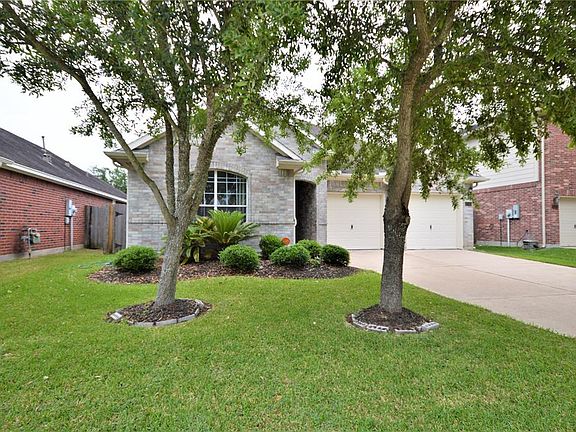 Exterior of this all brick home has cement board trim, double paned windows and updated fencing. Recent painting of wrought-iron fencing for views to the lake.