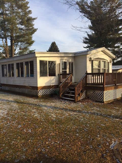 view of home facing lake