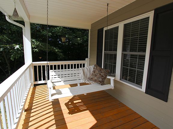 Swing on large front porch