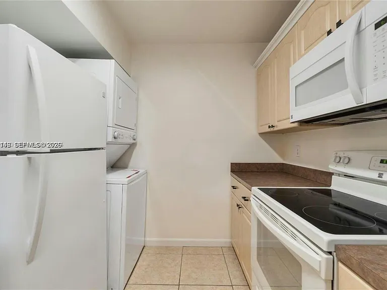561 NW 100th Pl #201 — Photo 16