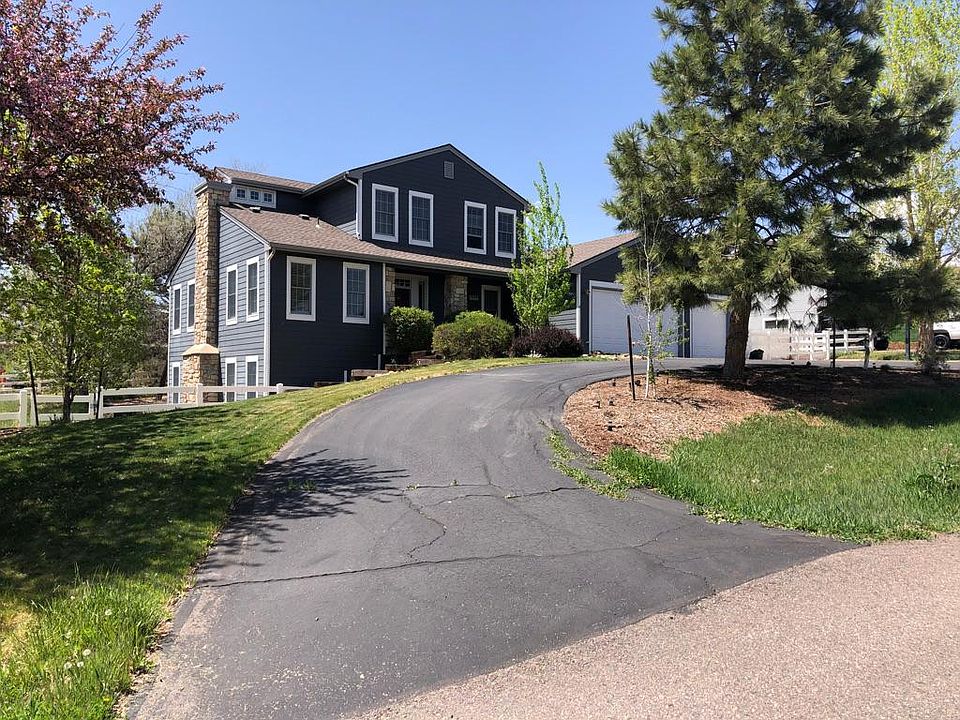 Circle drive with three-car garage