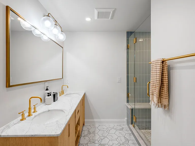 Basement Bathroom with Double Sinks
