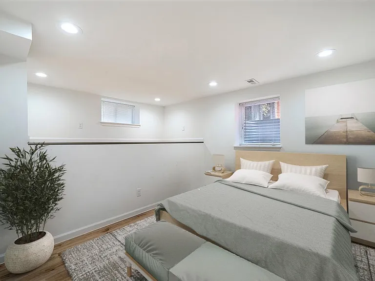 Bedroom 6. This image shows a virtually furnished space. Bedrooms come unfurnished.