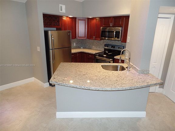 2nd image of 3440 Pinewalk Dr N APT 513