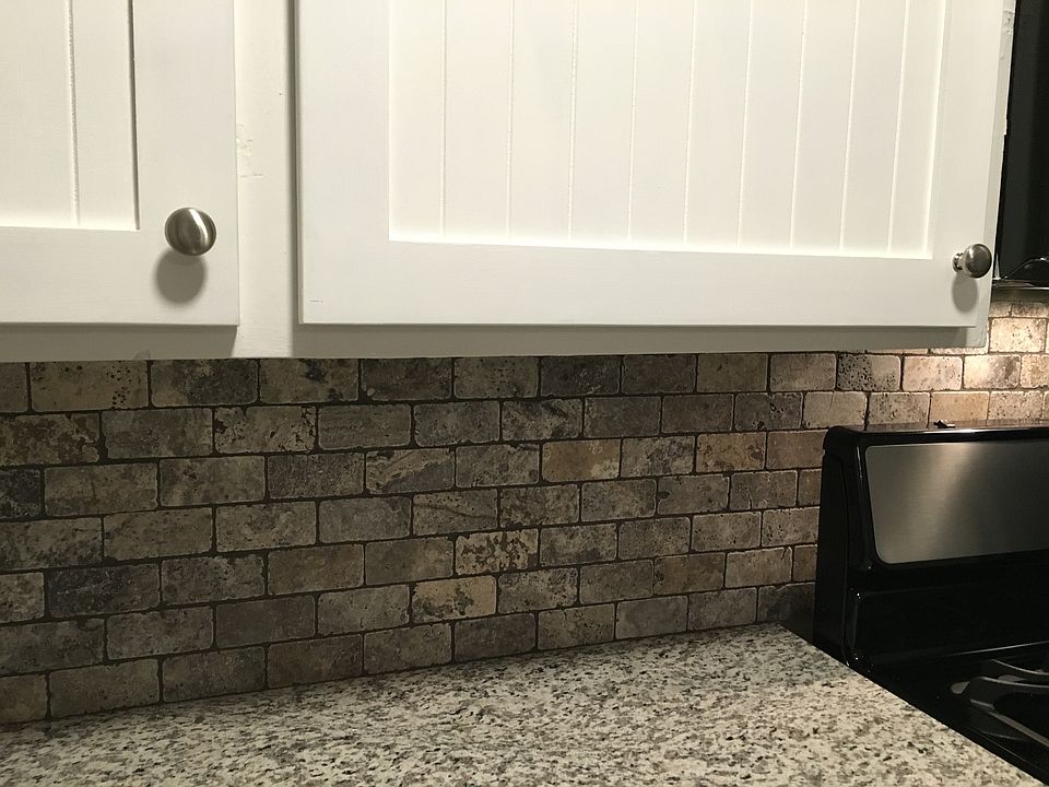 beautiful tumbled marble backsplash and granite counters