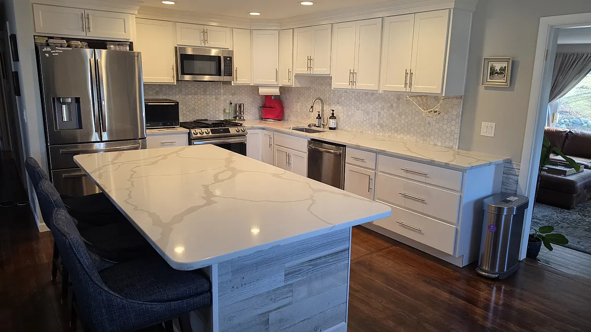 Remodeled (2024) Kitchen with 6 person island and built-in beverage fridge - 31 Ontario Dr