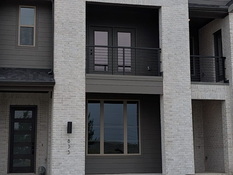 Building Exterior with 1st and 2nd Floor Patios