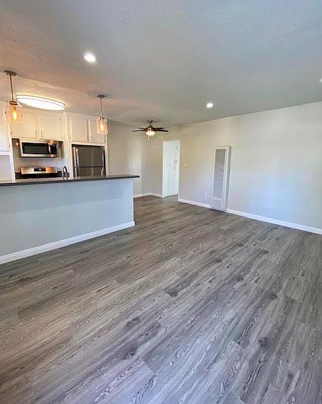 Gorgous open floor plan, New appliances, flooring, light fixtures. and MORE!