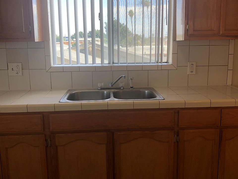 The kitchen sink counter area.