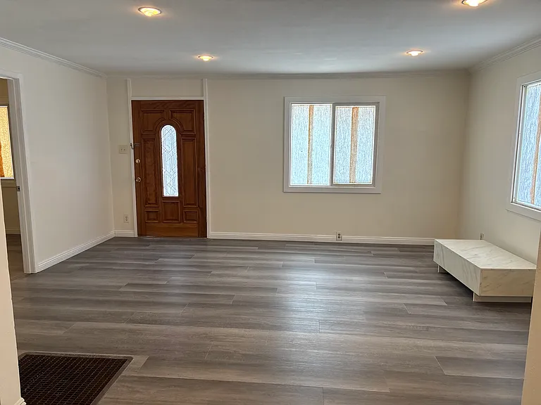 Side entrance and living room